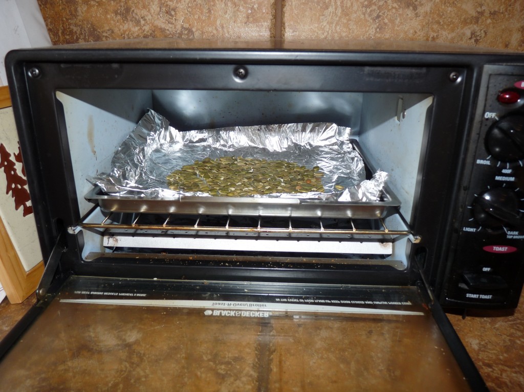 Toast pumpkin seeds or pine nuts for a minute or two, watching so they don't burn!