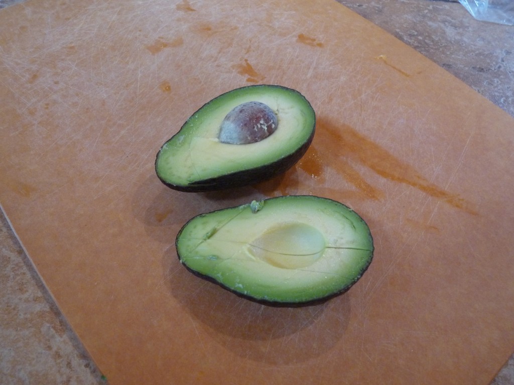 Slice and dice an avocado (the same way you just did the mango) and add to salad